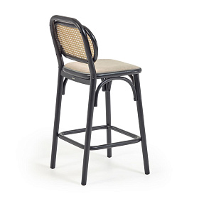 Барный стул Doriane из цельного вяза высотой 65 см с черным лаком и мягким сиденьем